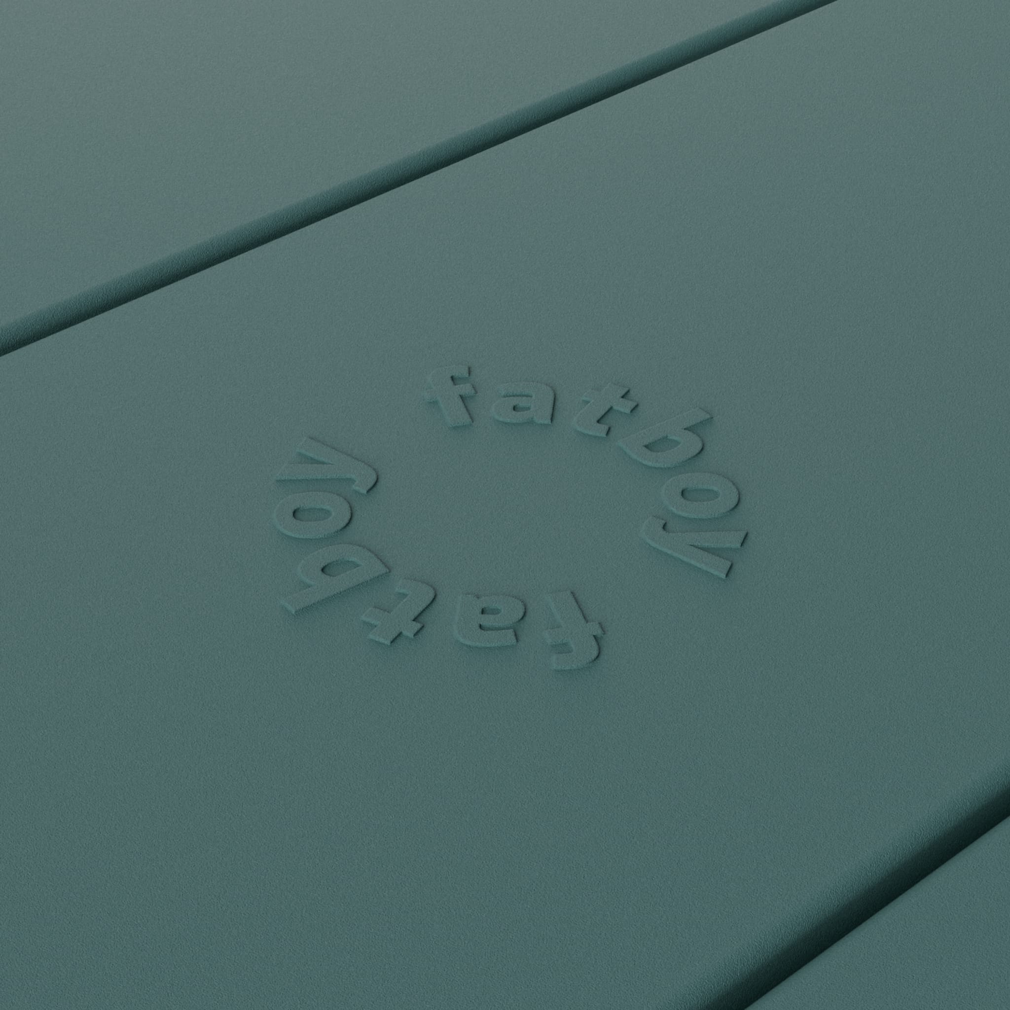 Close-up of Fred’s table by Fatboy in dark sage, showcasing its durable aluminum slats for a sleek and weather-resistant finish.