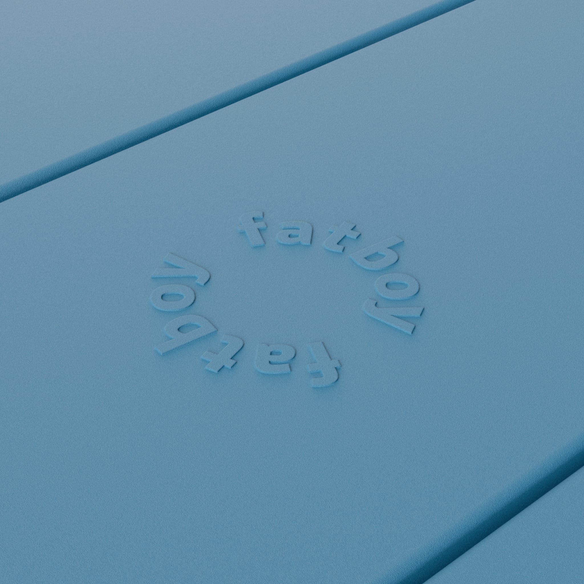 Close-up of Fred’s table by Fatboy in wave blue, showcasing its durable aluminum slats for a sleek and weather-resistant finish.