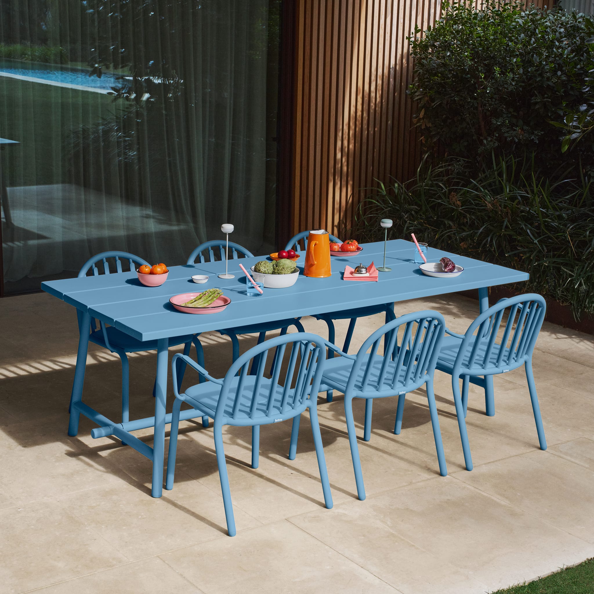 Comfortable armrests and curved seat of Fred’s Armchair, designed for long-lasting outdoor relaxation.