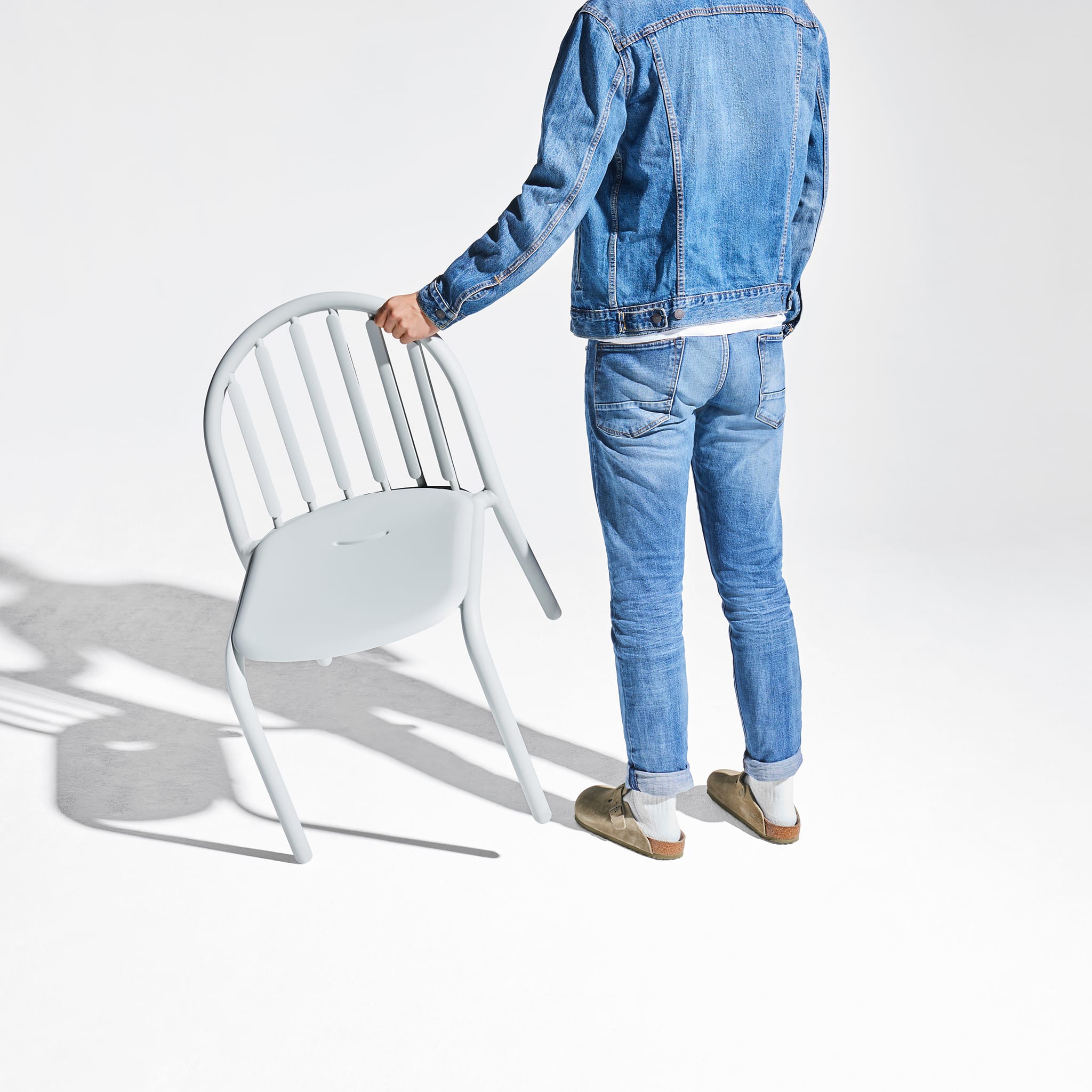 Fred’s Chair in motion, highlighting its lightweight build and convenient portability for effortless outdoor use.