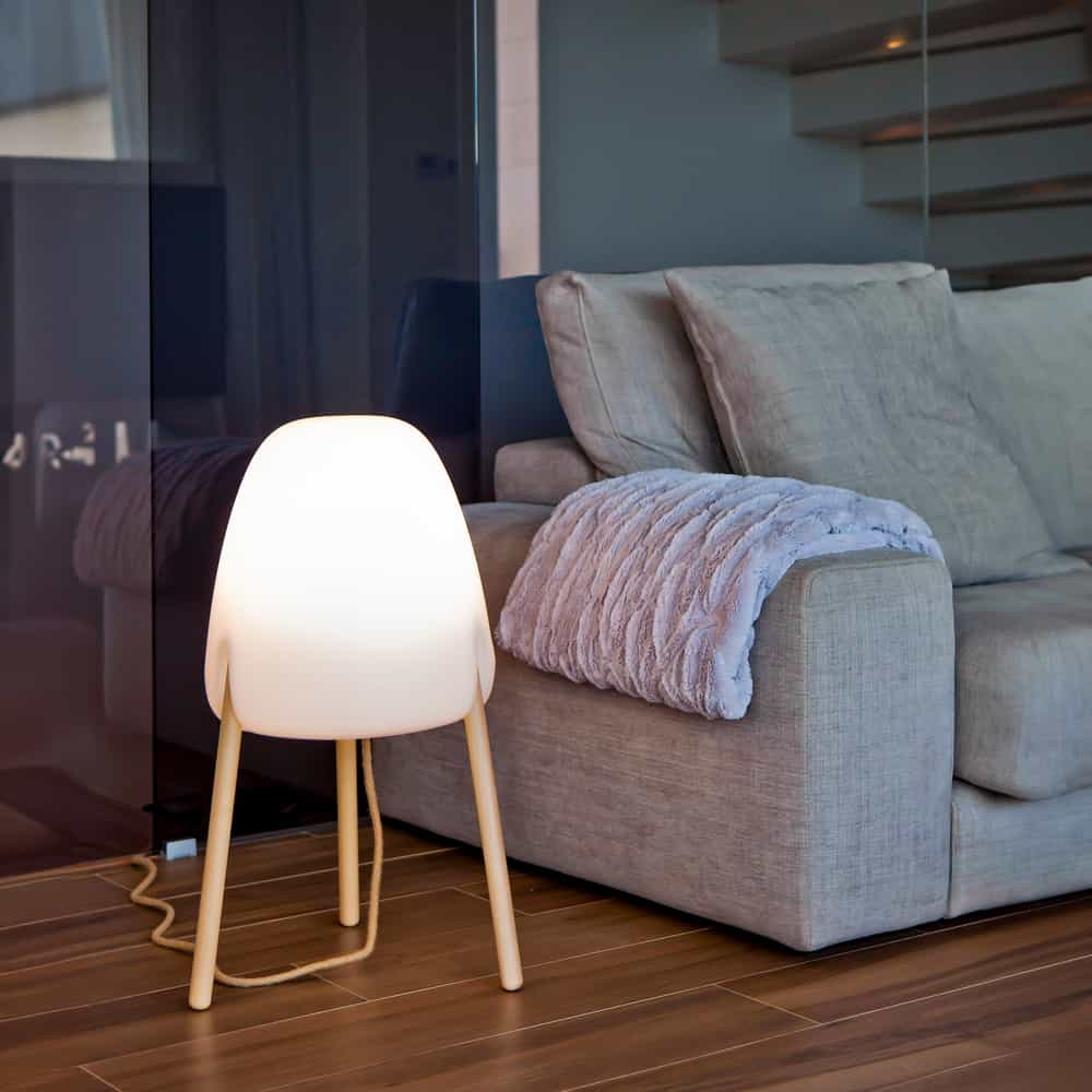 Rocket, a distinctive floor lamp from Newgarden, perfect for indoor/outdoor spaces. Adjustable light color and intensity.